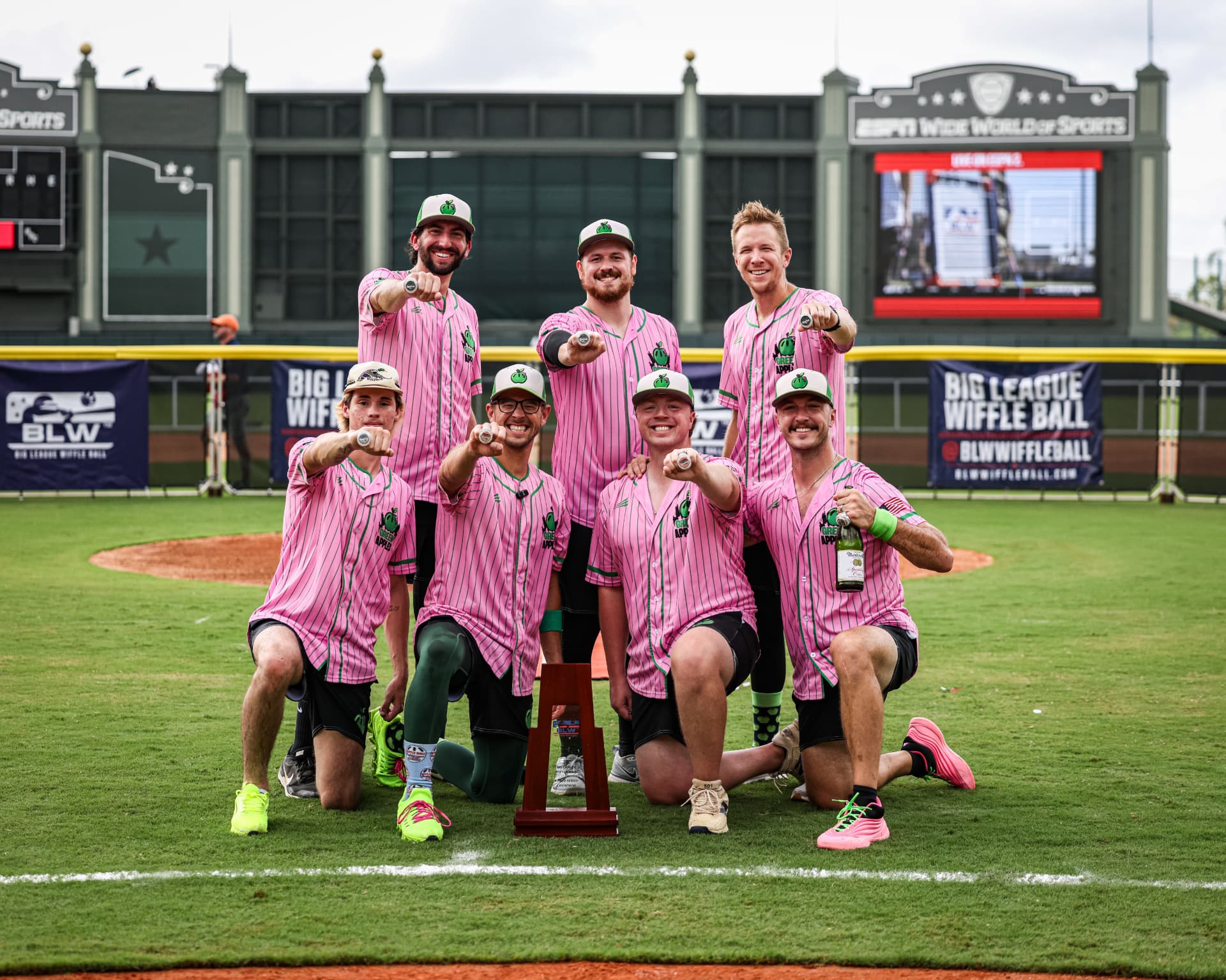 Champions showing their rings
