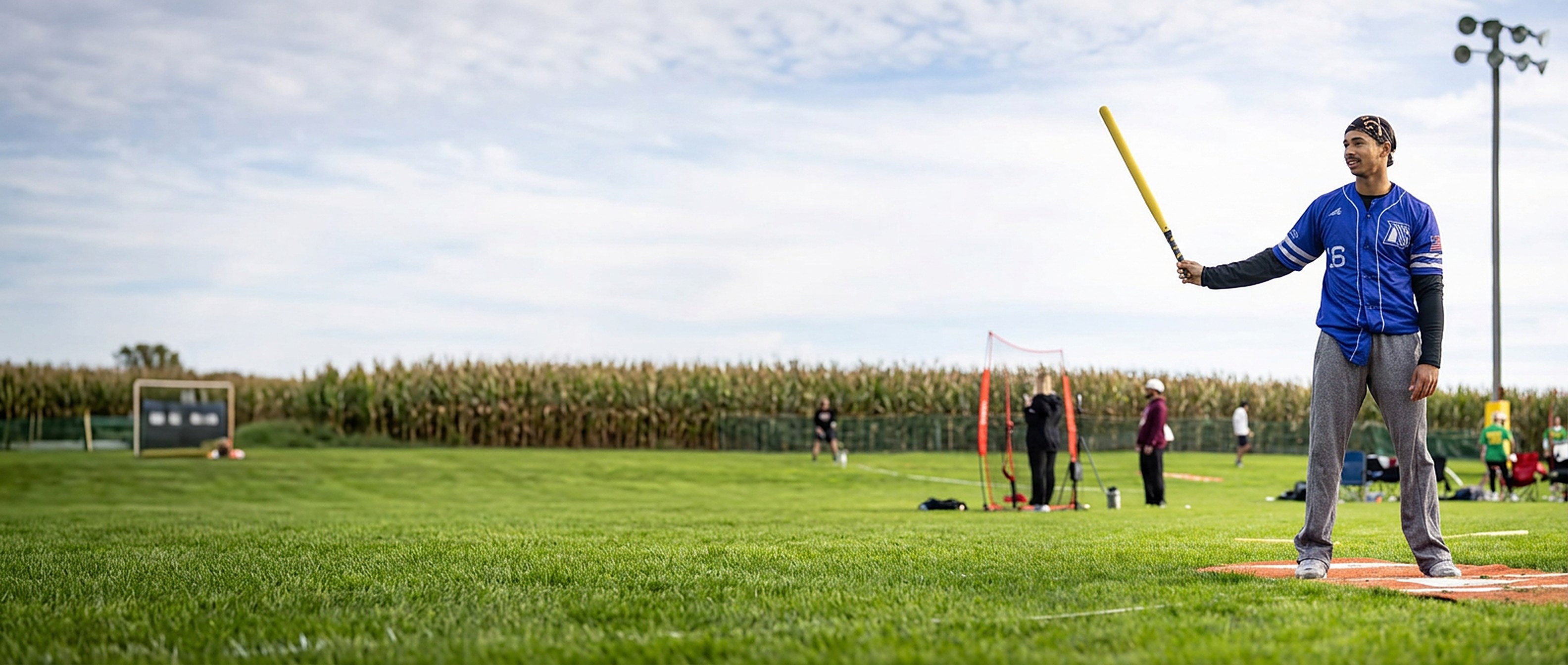 A Wiffle Ball pitcher gripping the official ball